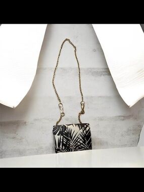 Anne Klein Black and Cream Palm-Print Crossbody with Gold Chain Strap